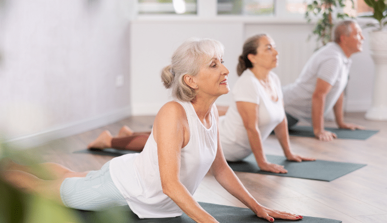Seniors doing yoga